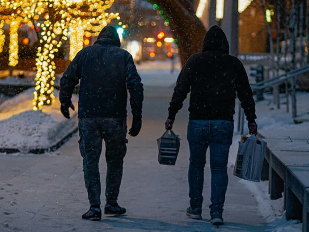 Men walking in the snow.