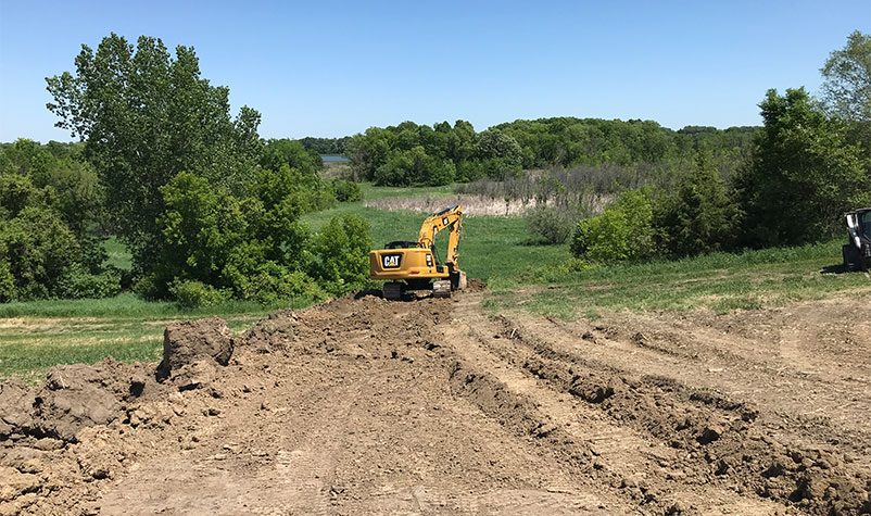machine on soil outside