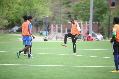 Group of men playing soccer