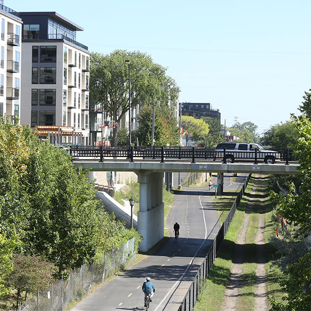 greenway with bridge and cars